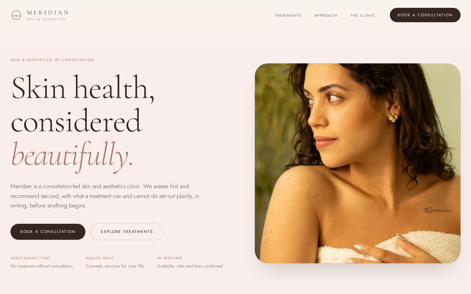 Aesthetic Clinic website design shown on a laptop and iPhone