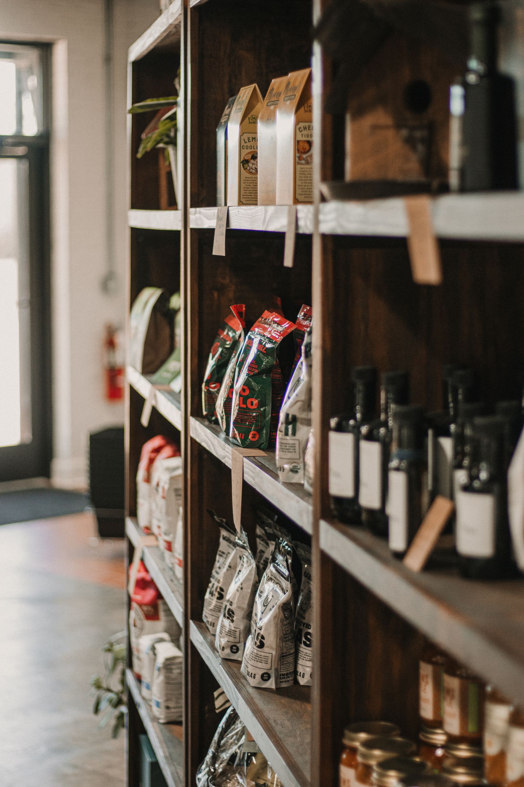 Shelves of packaged artisan food and drink products in an independent store