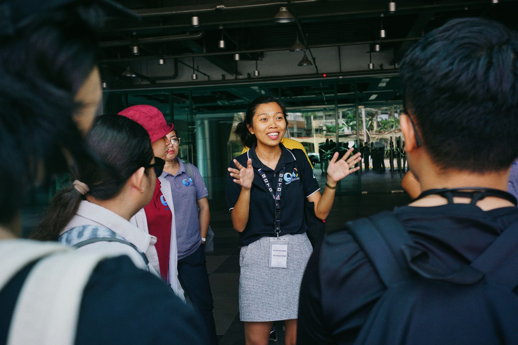 A tour guide briefing a group of travellers before an activity